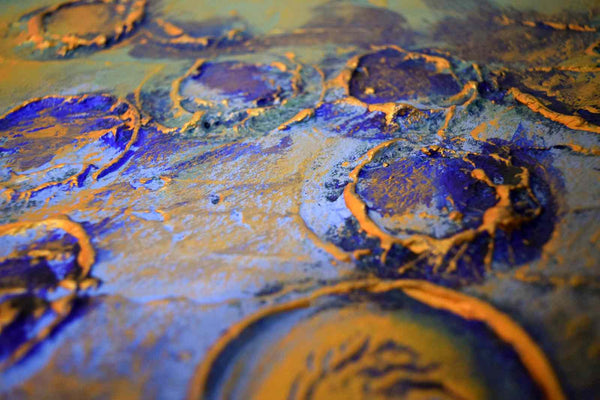 Painting Modern Art in gold and blue