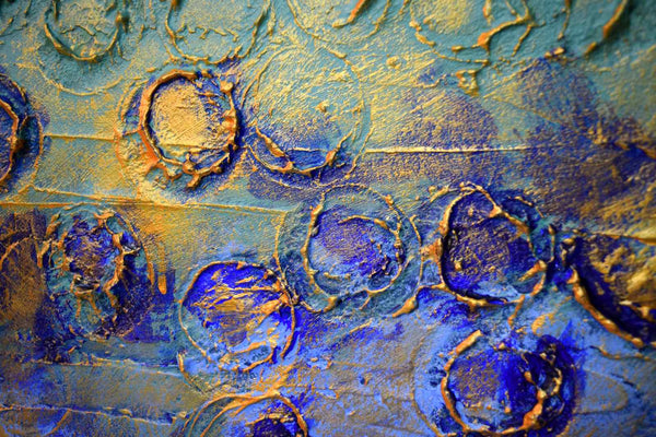 Painting Modern Art in blue