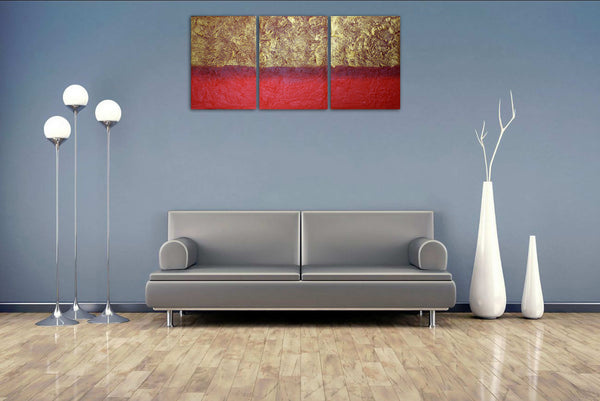 3 piece painting in gold on grey wall