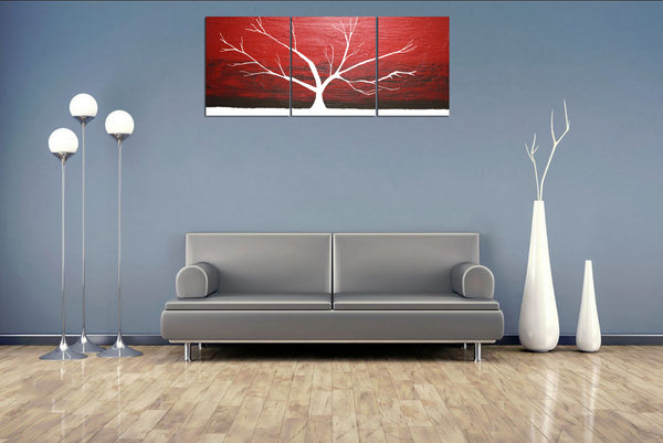 abstract tree painting on a grey wall