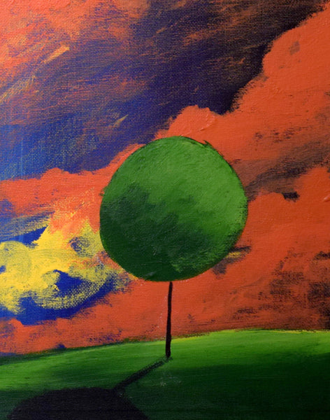 giant wall art in orange green tree on a hill