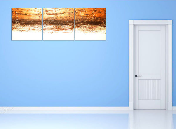 copper artwork in 3 panel size on blue wal