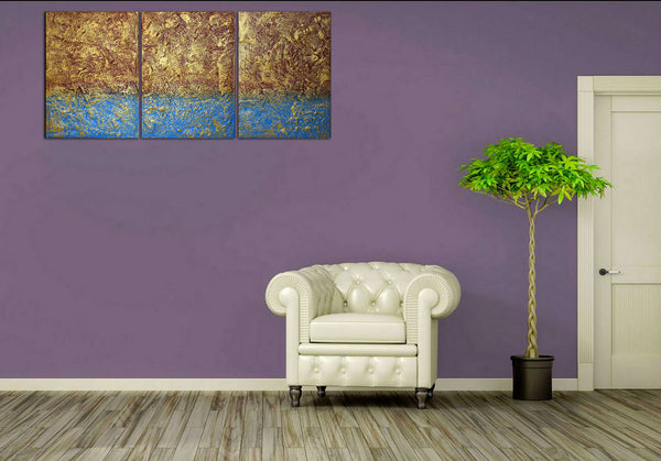 3 piece painting in gold blue on a purple wall
