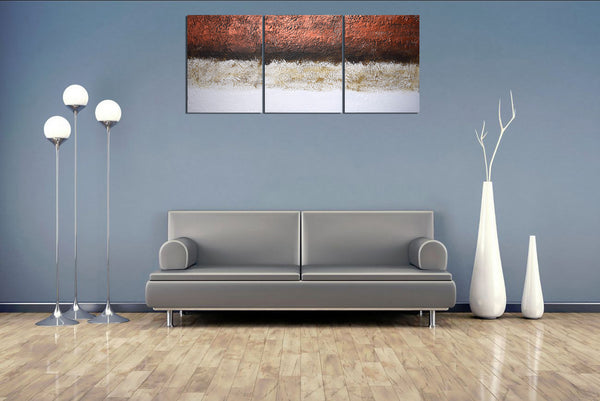 copper artwork triptych painting on grey wall