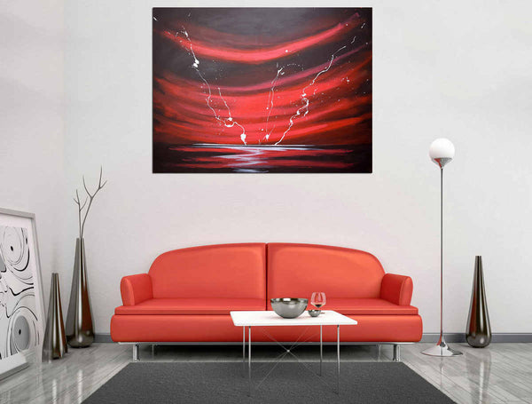 big red seascape artwork on a modern grey interior wall with red sofa