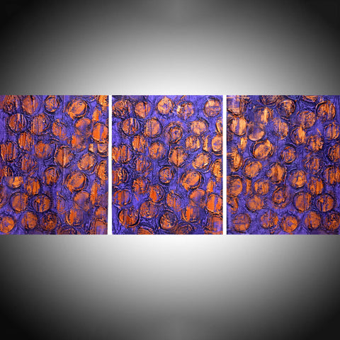 purple paintings on canvas in purple and copper on a grey background