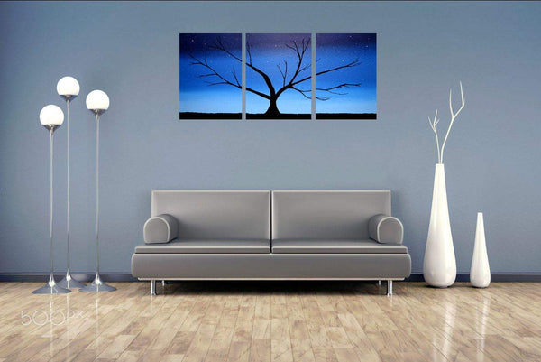 large canvas wall art, in triptych style blue on grey wall