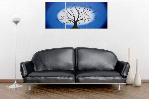 blue painting on a white wall triptych canvas