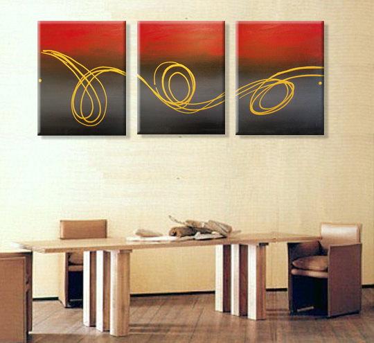 triptych wall art " Gold Horizon " on canvas, on cream wall